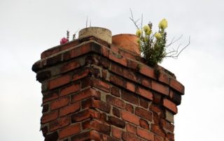 damaged chimney of an old house