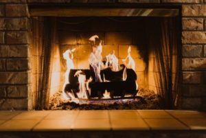 : Wood burning in an indoor fireplace 