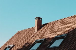 A roof with a chimney