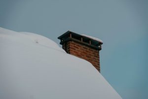 A chimney covered with ice