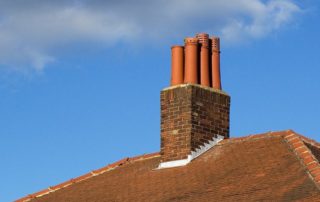 a brick roof with a chimney