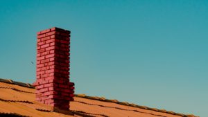 Chimney roof needing cleaning and repair services