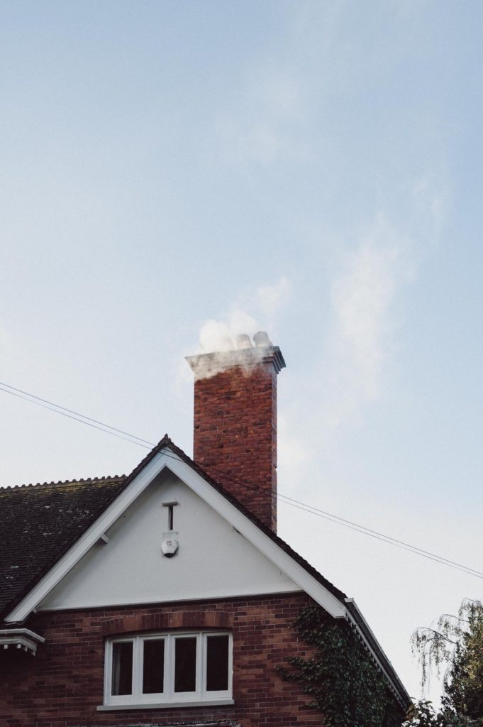 a chimney emitting smoke